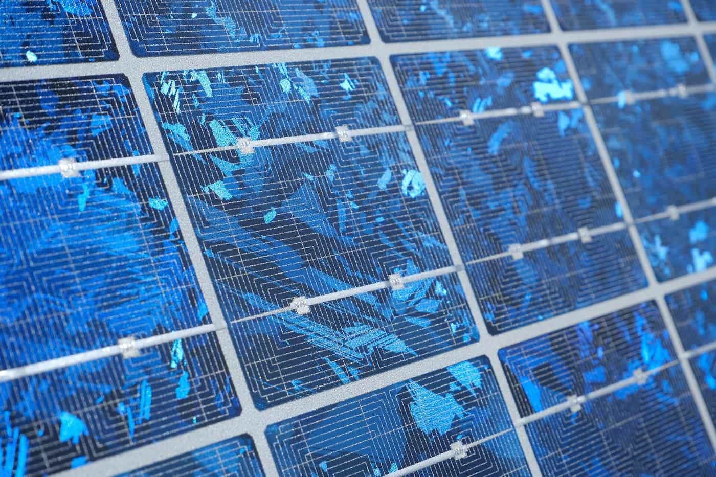 Close-up of the blue cells and busbars of a solar panel